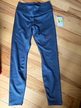 NWT Nike Women’s Blue Gray Geometric patterned One Luxe Leggings with Red Swoosh